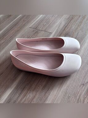 Crocs Women's Pink Ballet Flats - Comfortable Slip-Ons size 11